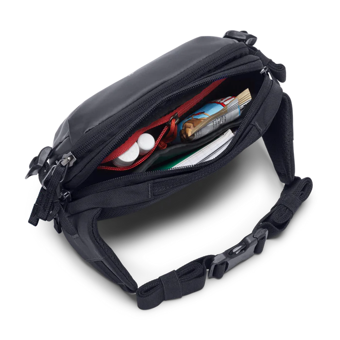 Cotopaxi Allpa X 1.5L Hip Pack - Cotopaxi Black top view of open zippered pocket