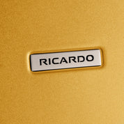 Ricardo Beverly Hills Cambria Hardside Large Check-In Expandable Spinner -Mango Tango