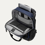 Travelpro Altitude™ Medium Expandable Laptop Backpack 25-30L top view of main compartment open and llap top sticking out of other compartment