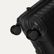 Travelpro Optima® Expandable Medium Check-in Spinner - Black