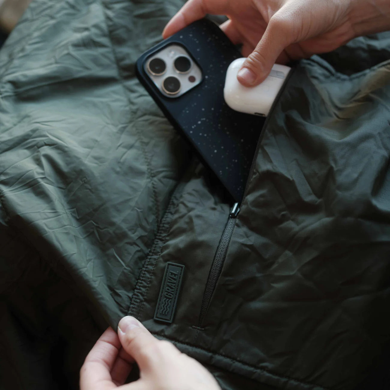 Square packable blanket,close up view of blanket pocket